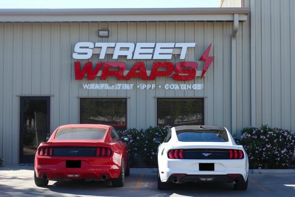Channel letter sign for Street Wraps in El Centro, CA, designed and manufactured by CNS Signs, featuring bold illuminated lettering on a commercial building.